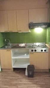 A kitchen or kitchenette at Residence Tarvisio Camporosso