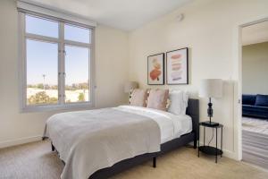 a bedroom with a large bed and a window at Mountain View 2BR w Gym Lounge nr Highways SFO-1080 in Los Altos +21 photos
