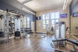 a gym with treadmills and machines in a room at San Jose - The Alameda 2br w gym pool SFO-1153 in San Jose