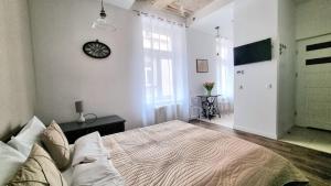 Łóżko lub łóżka w pokoju w obiekcie NOOK NOOK Apartments Katarzyny 2