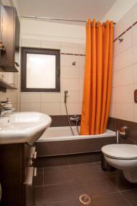 A bathroom at Anita Luxury Apartment