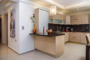 A kitchen or kitchenette at Anita Luxury Apartment