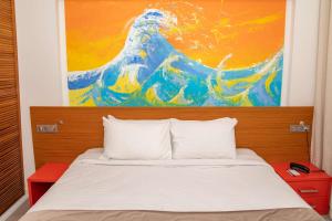 Postel nebo postele na pokoji v ubytování Best Western Arcachon Le Port