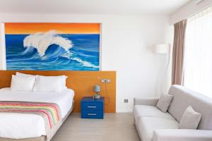 Postel nebo postele na pokoji v ubytování Best Western Arcachon Le Port