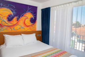 Postel nebo postele na pokoji v ubytování Best Western Arcachon Le Port