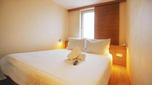 Postel nebo postele na pokoji v ubytování Hotel Düsseldorfer Hof
