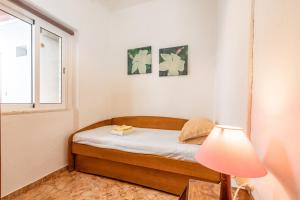 Postel nebo postele na pokoji v ubytování Travessa Albufeira Apartments by Umbral
