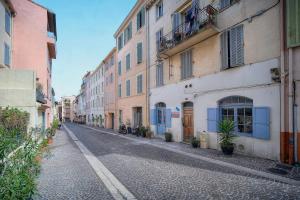 an empty street in a city with buildings at IMMOGROOM -historic center-Fully equipped apartment - AC - Wifi in Cannes