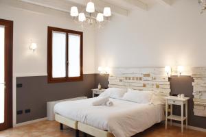 Venicegreen Agriresort客房内的一张或多张床位