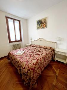 Postel nebo postele na pokoji v ubytování Hotel Terzo Crotto