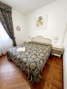 Postel nebo postele na pokoji v ubytování Hotel Terzo Crotto
