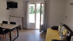 TV a/nebo společenská místnost v ubytování Premium Appartments Suha Punta