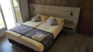 Postel nebo postele na pokoji v ubytování Premium Appartments Suha Punta