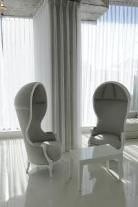 Гостиная зона в Kyriad Prestige Perpignan Centre Gare