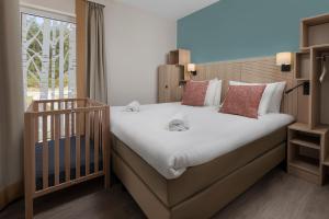 Postel nebo postele na pokoji v ubytování Terhills Resort by Center Parcs