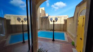 Bassein majutusasutuses Qala Bed&Breakfast with swimming pool - IL-Wenniessa või selle lähedal