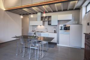 Kuchyňa alebo kuchynka v ubytovaní Apartments Florence Pepi attic + 9 fotografií