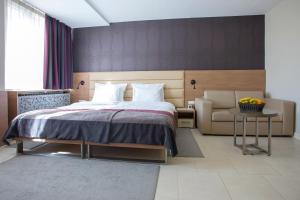 Ліжко або ліжка в номері Hotel Srbija Garden-FREE PARKING