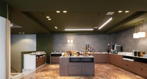 Kuchyň nebo kuchyňský kout v ubytování Nestos Hotel