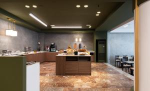 Kuchyň nebo kuchyňský kout v ubytování Nestos Hotel