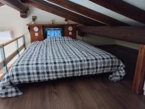 Postel nebo postele na pokoji v ubytování Casa Nel Vigneto