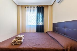 Posteľ alebo postele v izbe v ubytovaní FH MEDITERRANEO