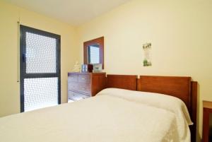 Postel nebo postele na pokoji v ubytování Club Villamar - Apartment Las Vegas