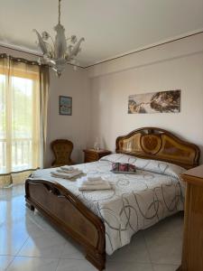 Krevet ili kreveti u jedinici u objektu La pigna delle Aci Apartment