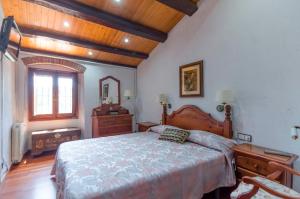 Postel nebo postele na pokoji v ubytování Club Villamar - Masia Can Vilar