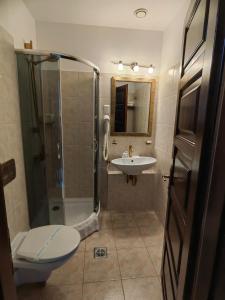Ванная комната в Hotel Carol