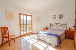 A bed or beds in a room at Club Villamar - Stralitzia
