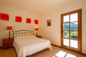 A bed or beds in a room at Club Villamar - Stralitzia