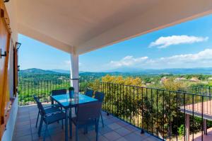 a balcony with a table and chairs and a view at Club Villamar - Andes in Lloret de Mar