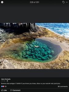 una foto de una piscina de roca en el océano en Mi casa su casa, en Caleta de Fuste 8 fotos más