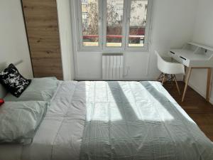 Posteľ alebo postele v izbe v ubytovaní F3 50m2 centre ville Massy