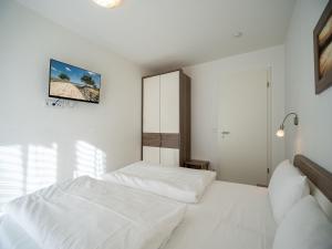 Postel nebo postele na pokoji v ubytování Seeresidenz Haus Baltic, App A02