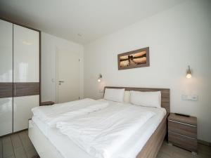 Postel nebo postele na pokoji v ubytování Seeresidenz Haus Baltic, App A02