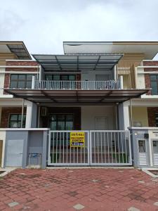 a house with a balcony with a sign on it at 88 Cozy House in Kuala Selangor