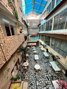 an overhead view of a building with tables and chairs at Hotel Toledo FL in Cartagena de Indias