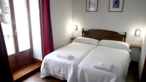 Hotel Branka客房内的一张或多张床位