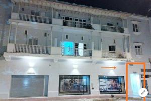 a large white building with balconies on top of it at apartamento centro histórico 303-1 in Cartagena de Indias