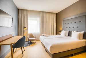 Postel nebo postele na pokoji v ubytování Mercure Hotel Amersfoort Centre + 37 fotografií