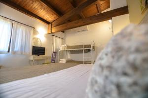 Postel nebo postele na pokoji v ubytování B&B Villa Adriana
