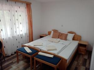 Postel nebo postele na pokoji v ubytování KONAK LJUBICA Rtanj + 37 fotografií