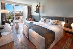 Кровать или кровати в номере Fuerteventura Princess