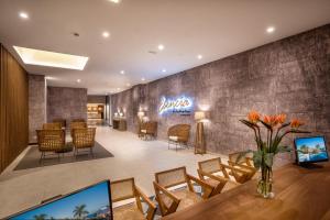 TV a/nebo společenská místnost v ubytování Esencia de Fuerteventura by Princess + 54 fotografií