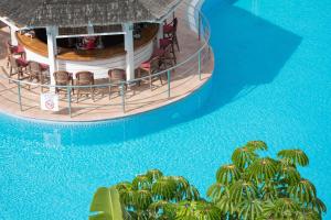 an overhead view of a pool at a resort at Mogan Princess & Beach Club in Taurito