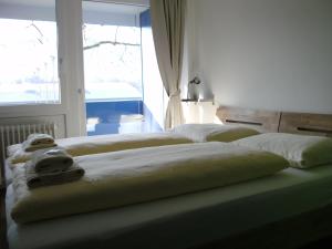 Postel nebo postele na pokoji v ubytování FT Hotel & Restaurant