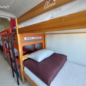 a bedroom with two bunk beds in a bus at CocaCosa in Casablanca