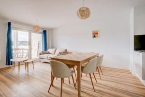 Televízia a/alebo spoločenská miestnosť v ubytovaní Très belle appartement haut standing